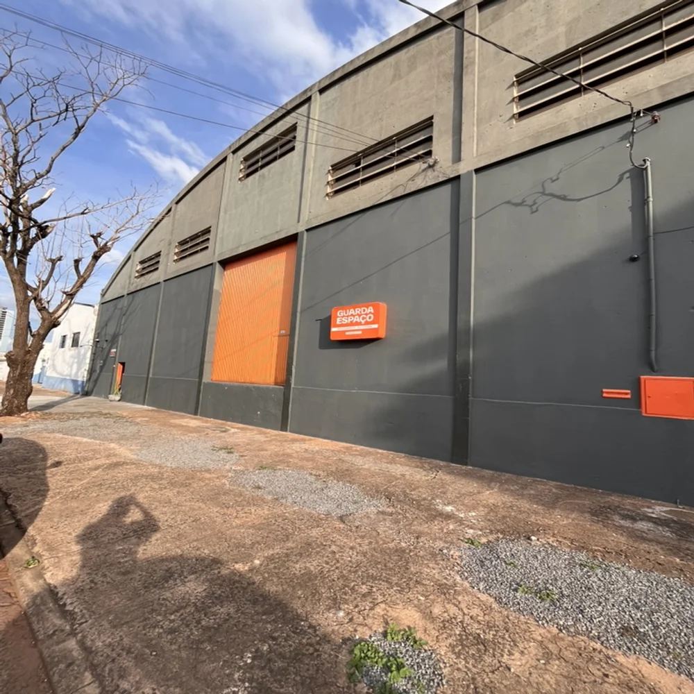 Modern high-security lock system on a storage door with orange focus